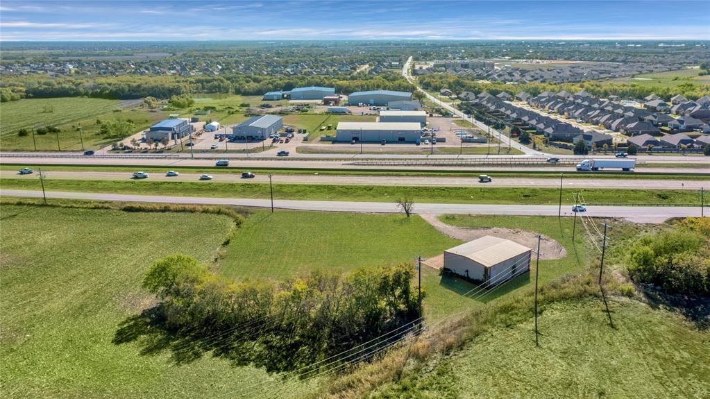 6000 Interstate 30 Fate, TX 75087 - Photo 3 of 18 a view of a city with lawn chairs