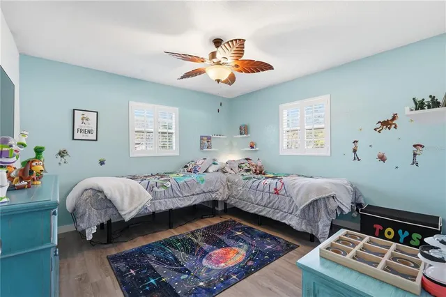 a bedroom with furniture and a large bed