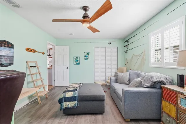 a view of washer and dryer with kitchen view