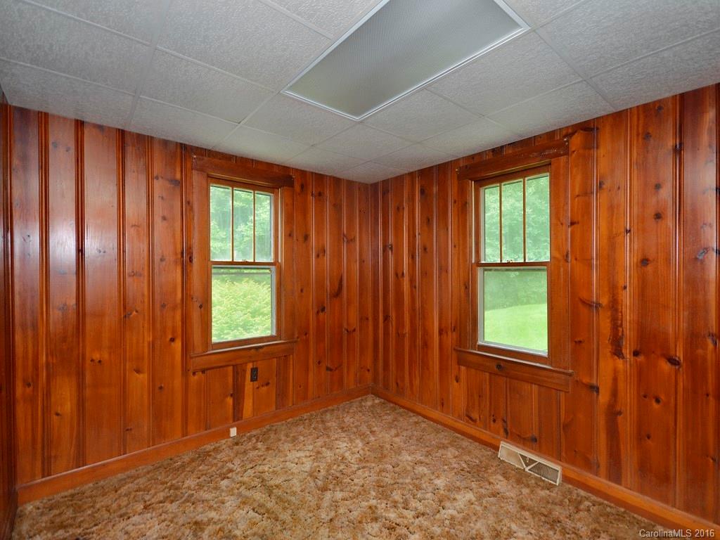 273 Pot Leg Road Waynesville, NC 28785 - Photo 8 of 12 a view of an empty room with a window