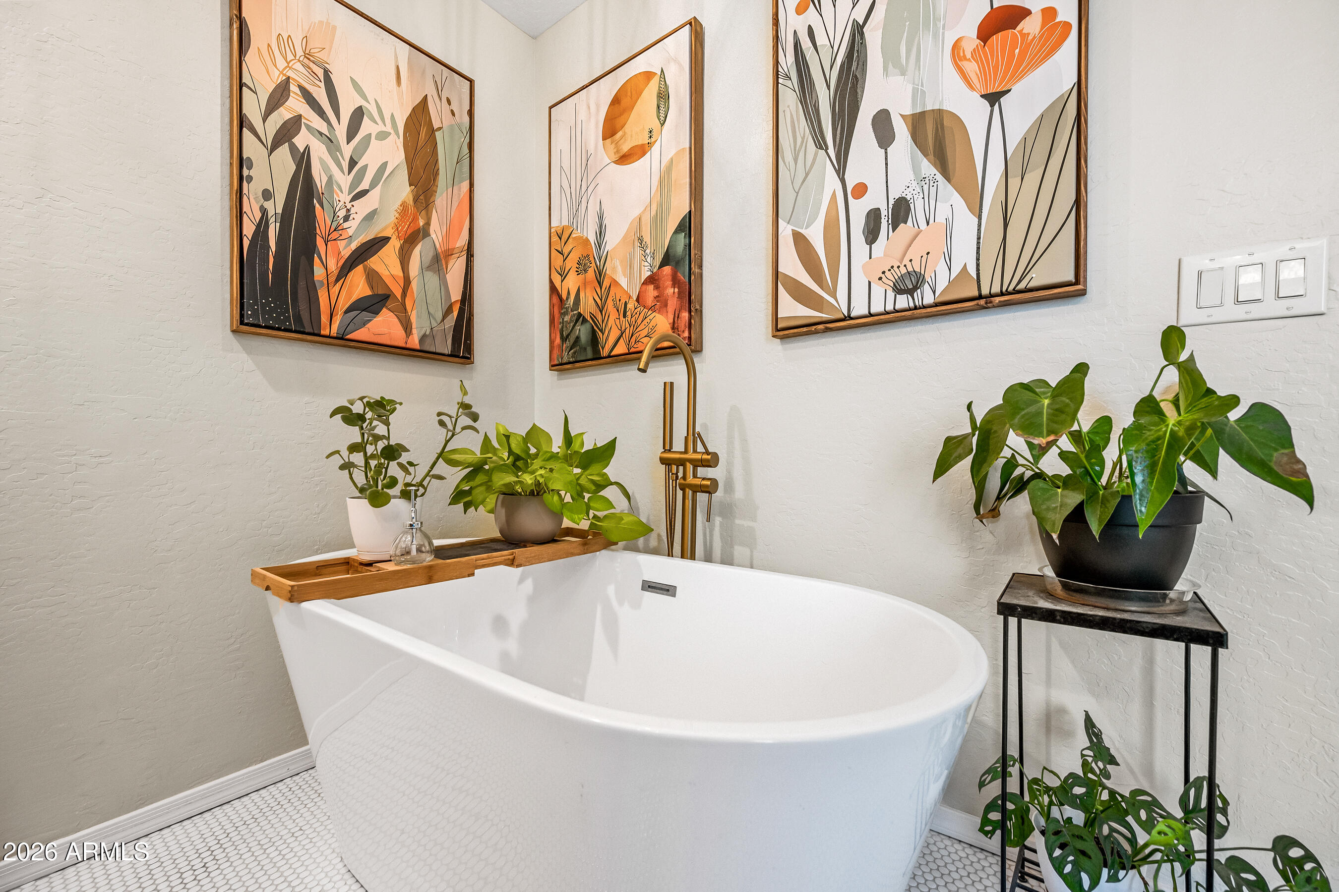 12734 West Cheery Lynn Road Avondale, AZ 85392 - Photo 8 of 54 a white bath tub with a window