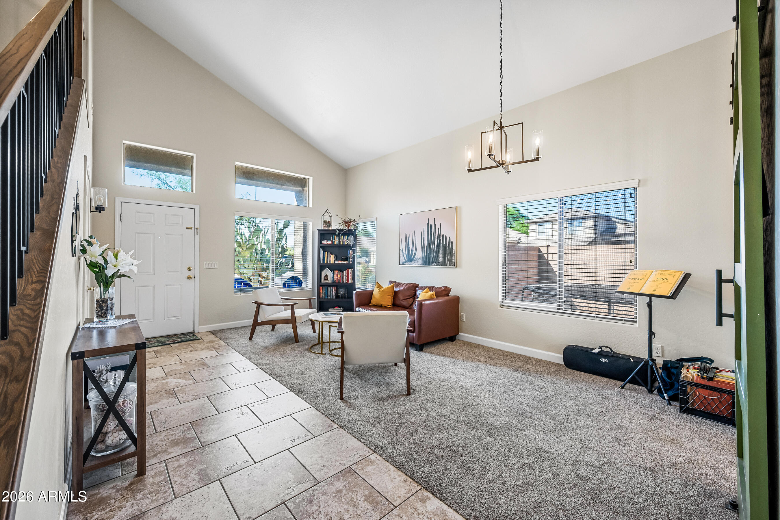 12734 West Cheery Lynn Road Avondale, AZ 85392 - Photo 13 of 54 a living room with furniture and a window