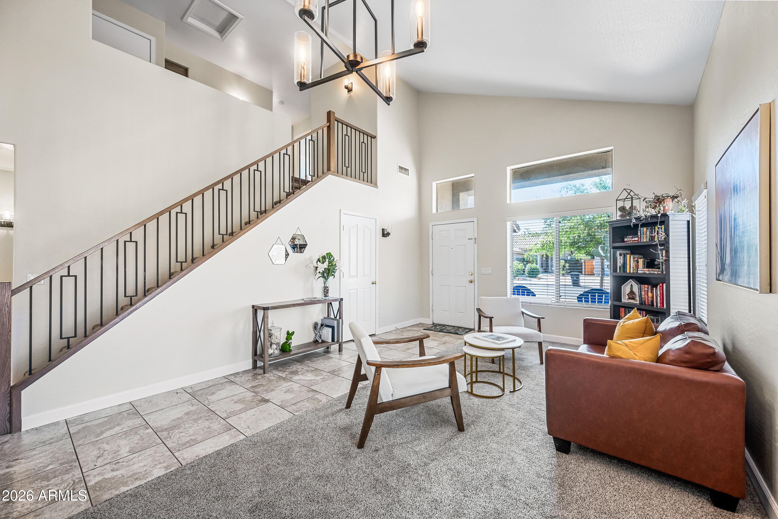 12734 West Cheery Lynn Road Avondale, AZ 85392 - Photo 14 of 54 a living room with furniture and a table