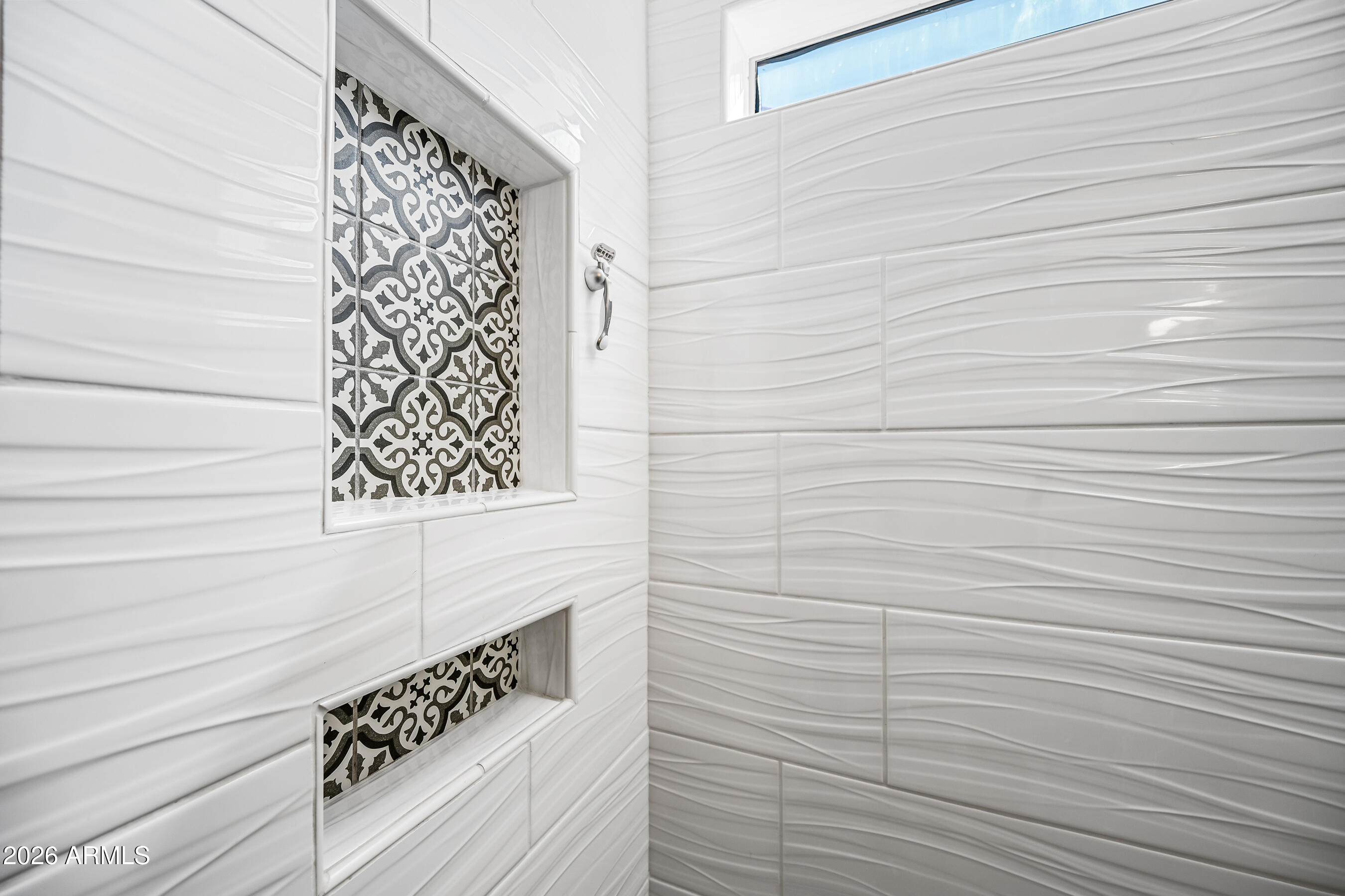 12734 West Cheery Lynn Road Avondale, AZ 85392 - Photo 34 of 54 a bathroom with a shower