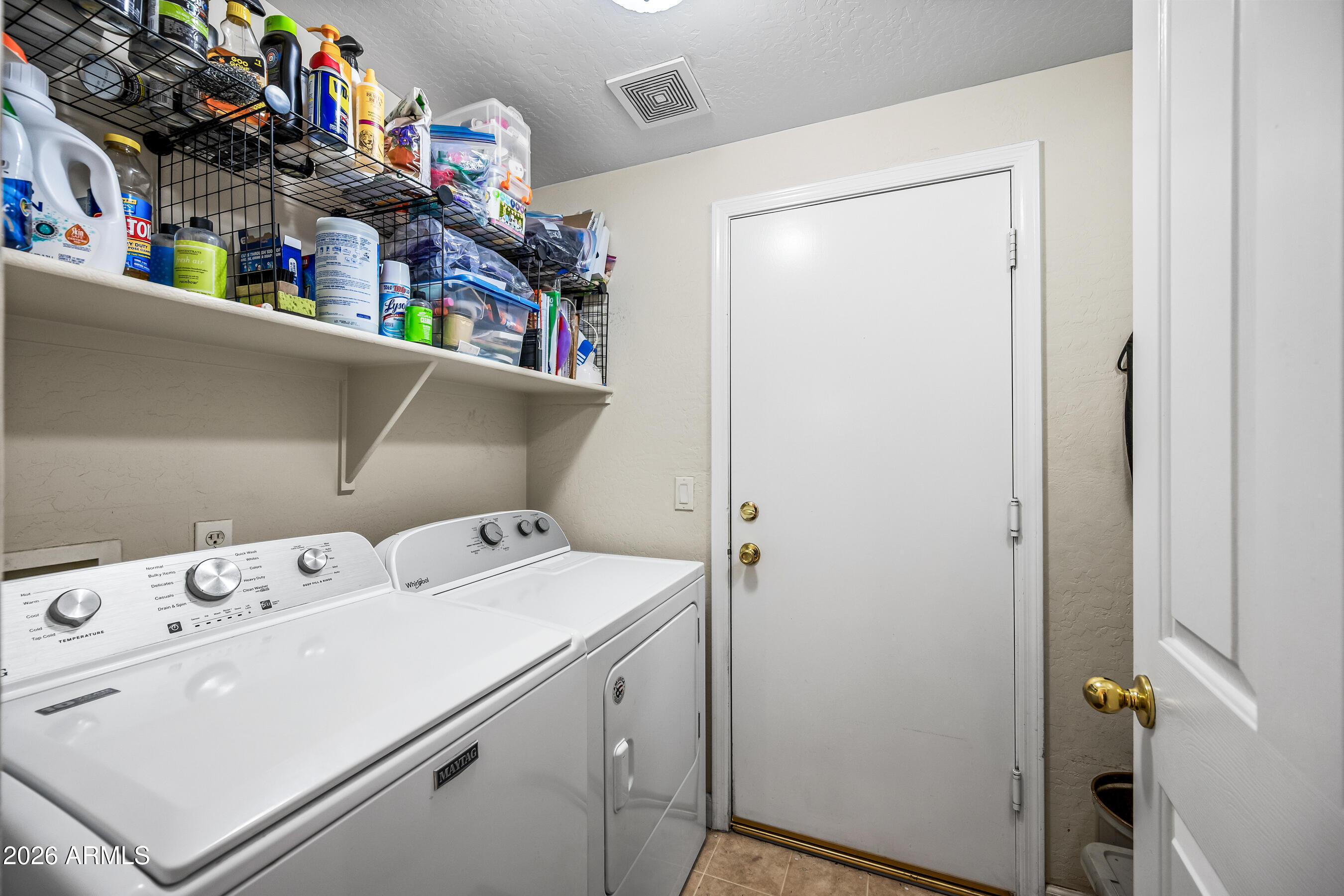 12734 West Cheery Lynn Road Avondale, AZ 85392 - Photo 38 of 54 a utility room with dryer and washer