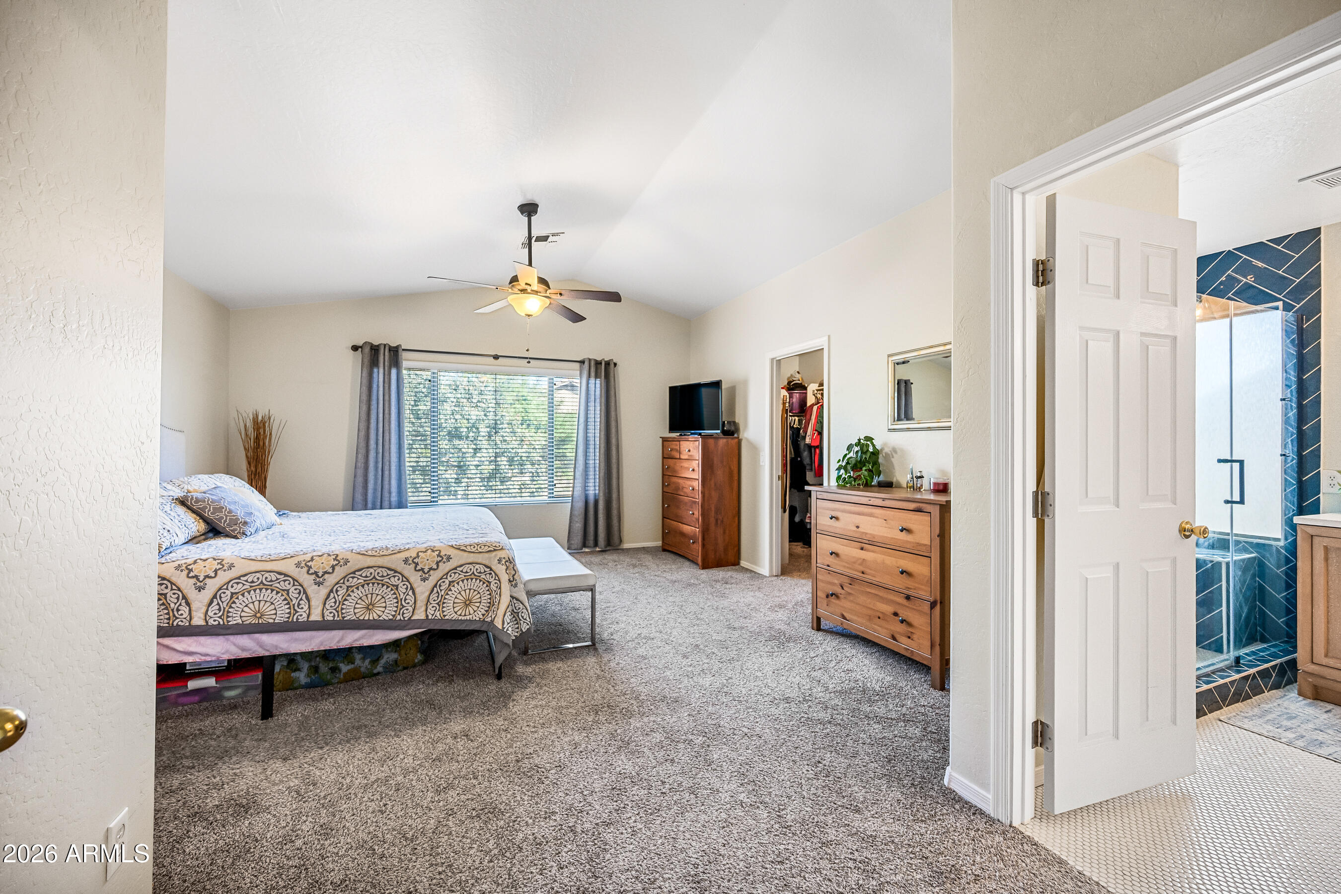 12734 West Cheery Lynn Road Avondale, AZ 85392 - Photo 39 of 54 a bed room with a bed and a window