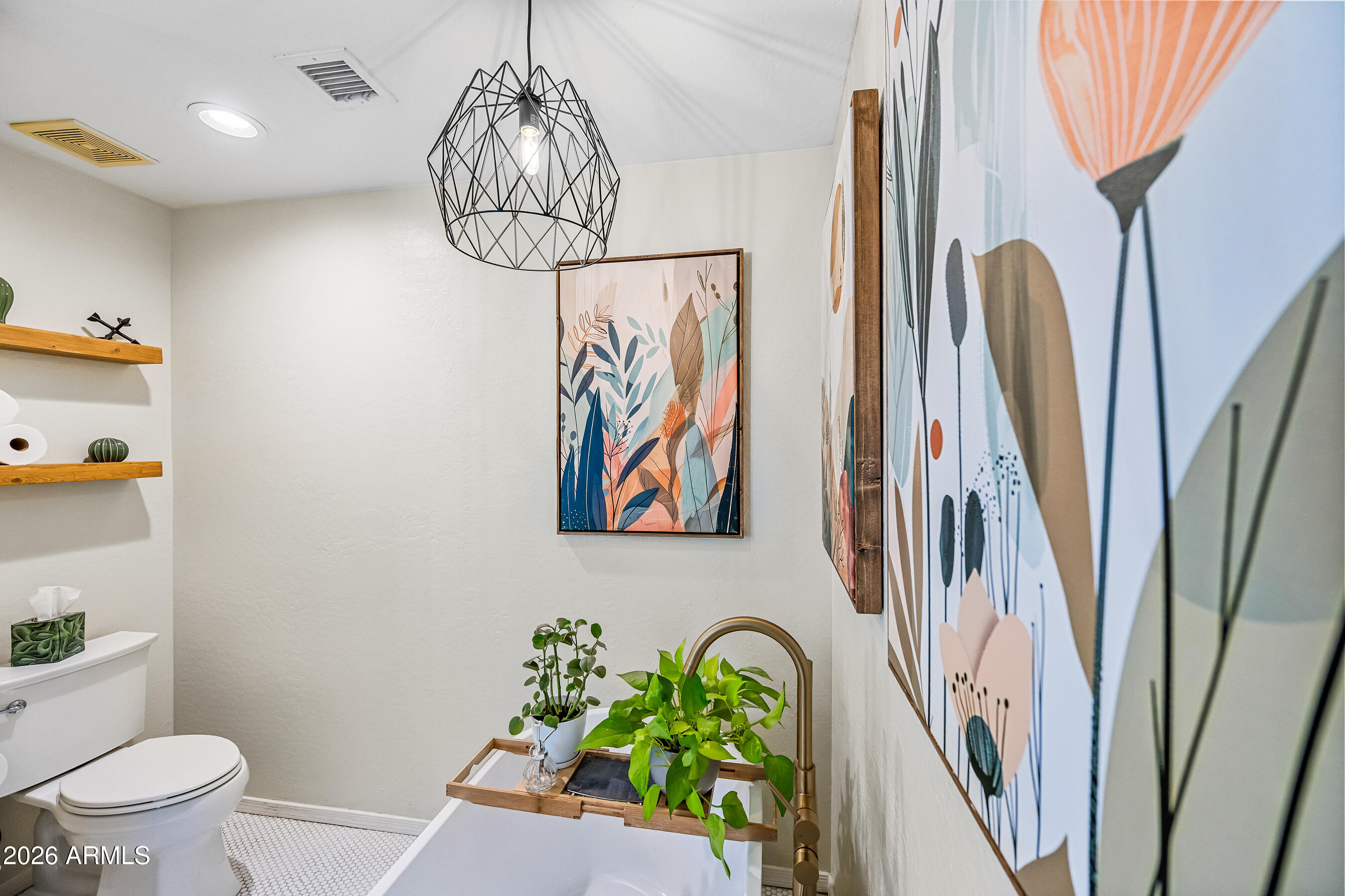 12734 West Cheery Lynn Road Avondale, AZ 85392 - Photo 44 of 54 a view of a hallway with wooden floor and entryway