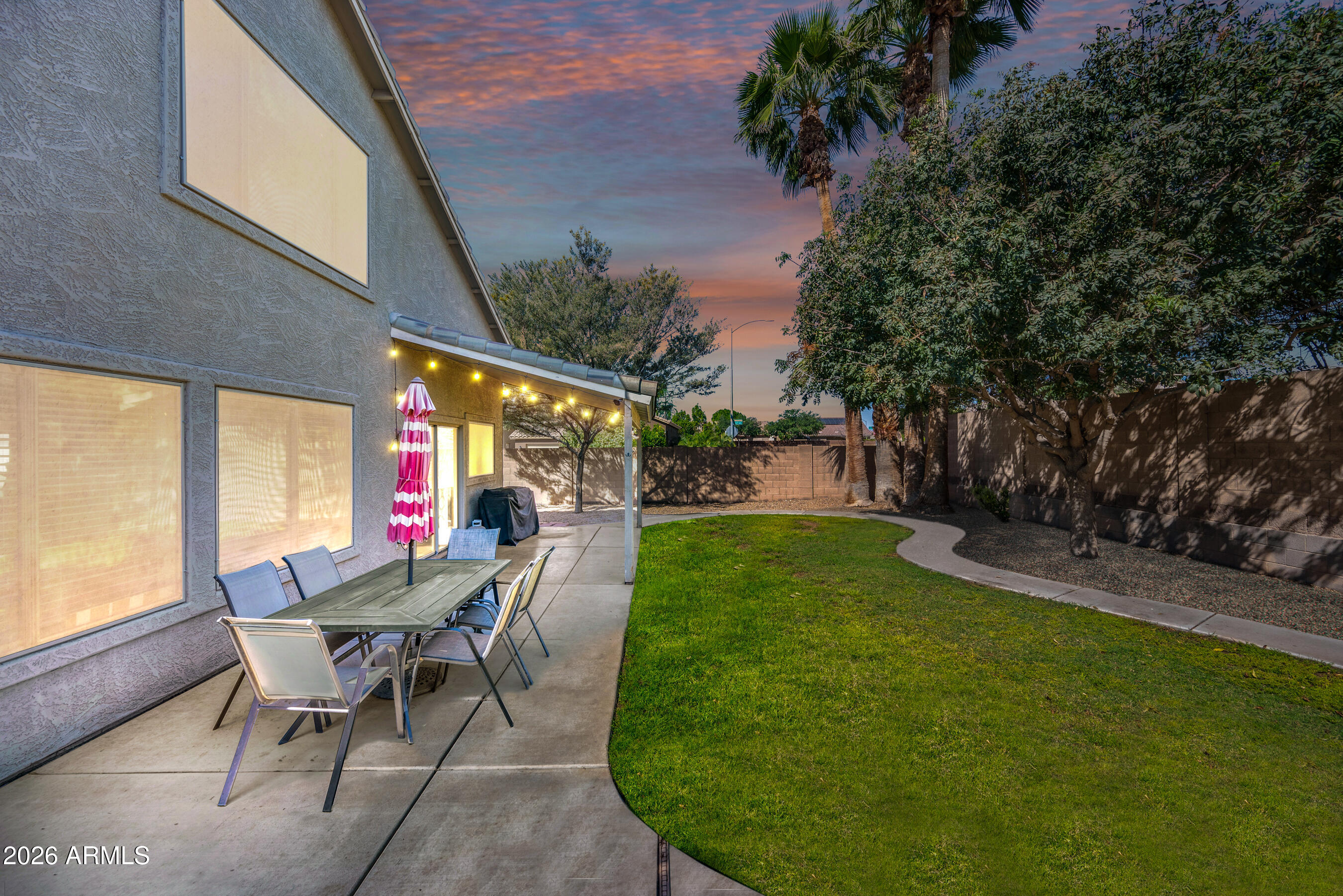 12734 West Cheery Lynn Road Avondale, AZ 85392 - Photo 6 of 54 a view of a chairs and table in patio of a house