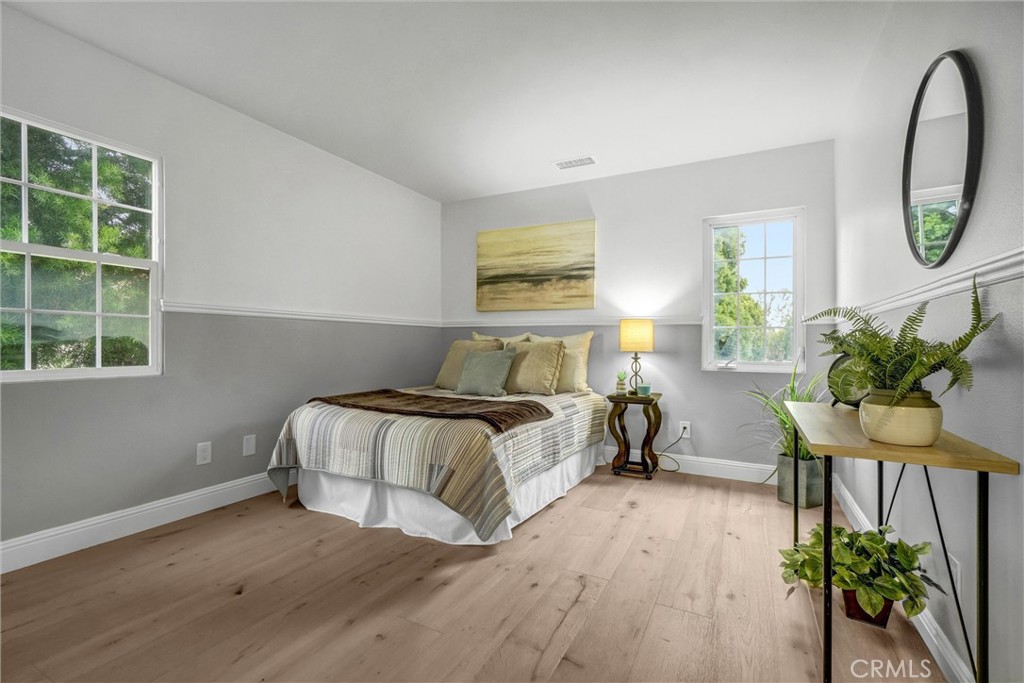 45 Avondale Irvine, CA 92602 - Photo 16 of 28 a bedroom with bed and a window