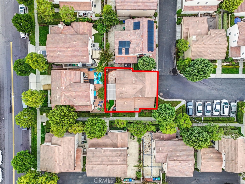 45 Avondale Irvine, CA 92602 - Photo 25 of 28 an aerial view of a house with a garden and a bench