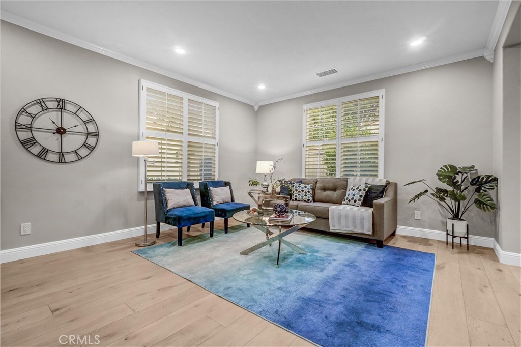 45 Avondale Irvine, CA 92602 - Photo 6 of 28 a living room with furniture and a large window