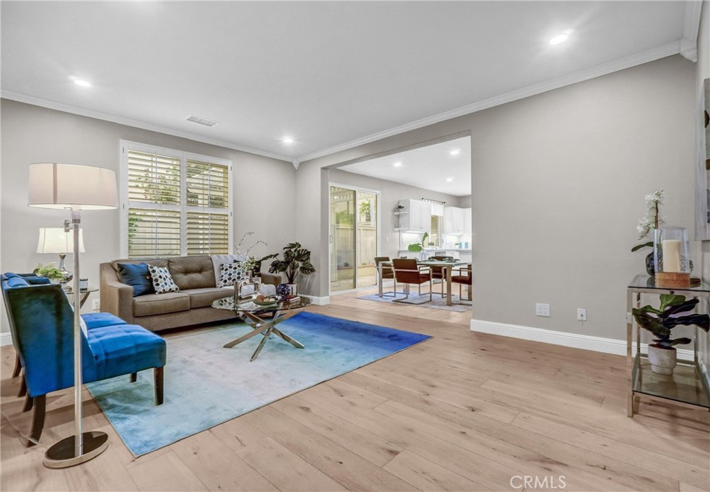 45 Avondale Irvine, CA 92602 - Photo 7 of 28 a living room with furniture and wooden floor