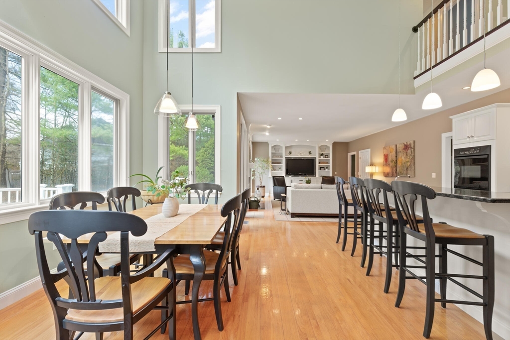 33 Bulkley Road Sudbury, MA 01776 - Photo 11 of 42 a view of a dining room with furniture window and outside view
