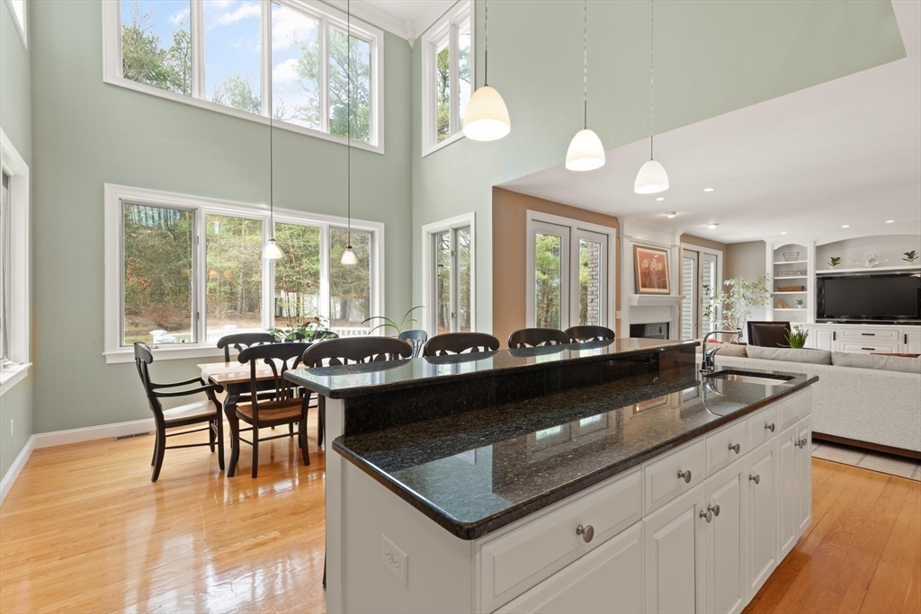 33 Bulkley Road Sudbury, MA 01776 - Photo 13 of 42 a kitchen with a stove and cabinets