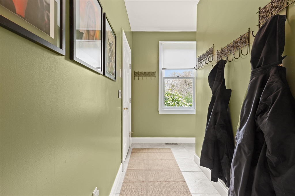 33 Bulkley Road Sudbury, MA 01776 - Photo 19 of 42 a view of walk in closet with clothes and shoes