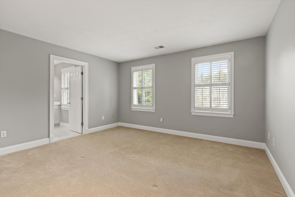 33 Bulkley Road Sudbury, MA 01776 - Photo 27 of 42 an empty room with windows