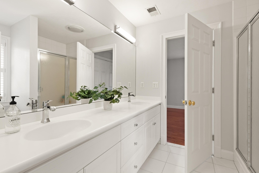 33 Bulkley Road Sudbury, MA 01776 - Photo 30 of 42 a bathroom with a sink and a mirror