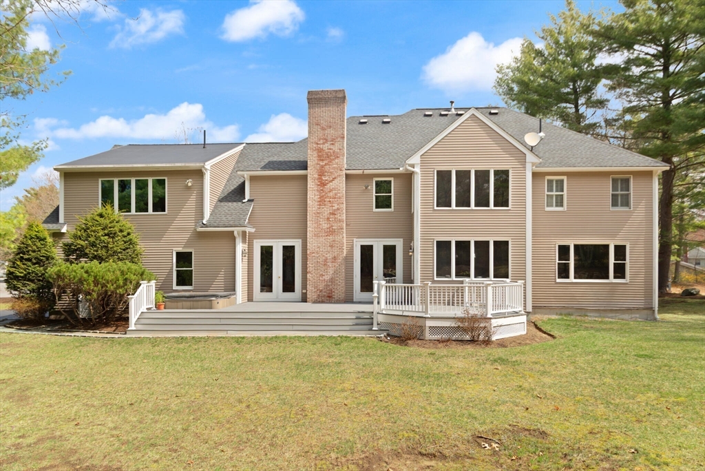 33 Bulkley Road Sudbury, MA 01776 - Photo 38 of 42 a front view of a house with a yard