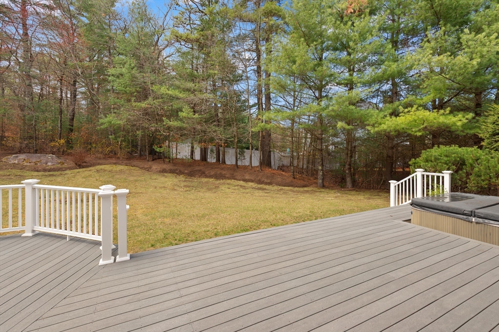 33 Bulkley Road Sudbury, MA 01776 - Photo 39 of 42 a view of a swimming pool with a bench