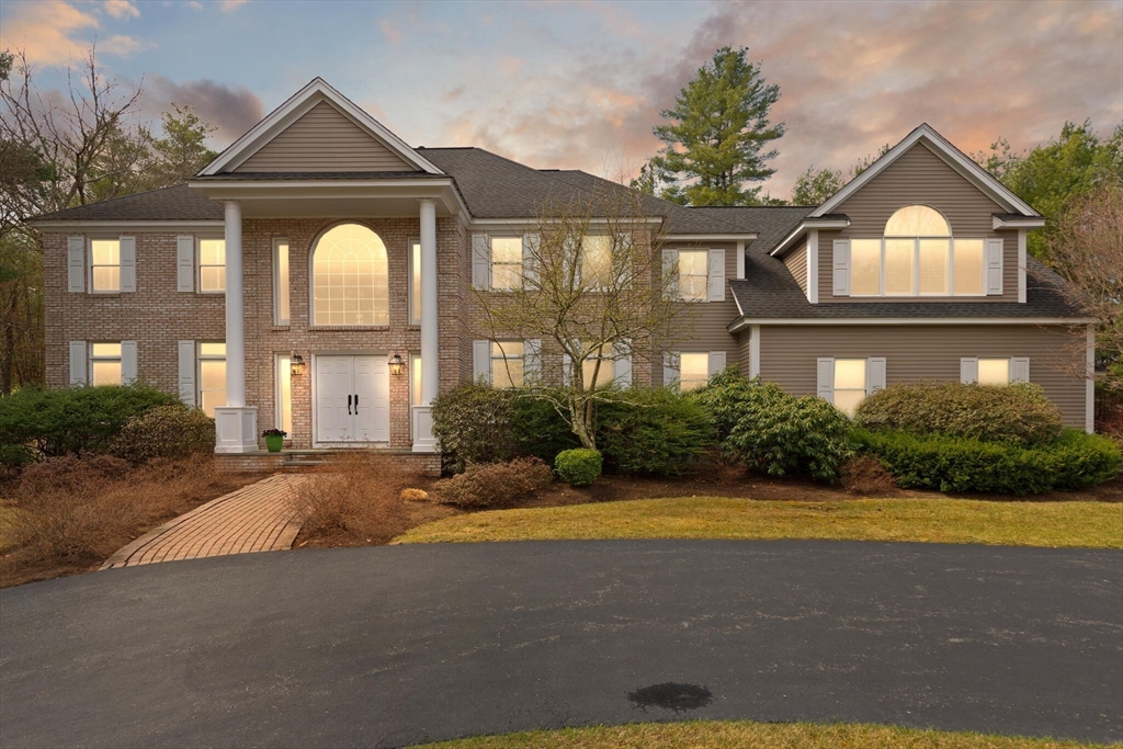33 Bulkley Road Sudbury, MA 01776 - Photo 41 of 42 a front view of a house with garden
