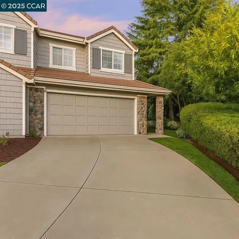 a house view with a outdoor space