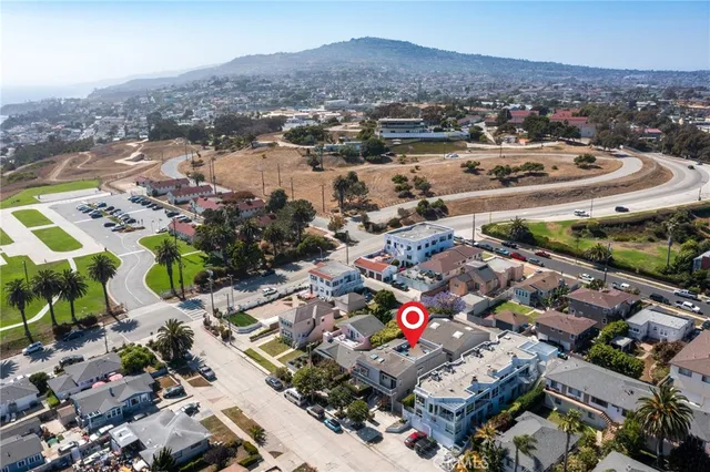 a kitchen with stainless steel appliances and cabinets
