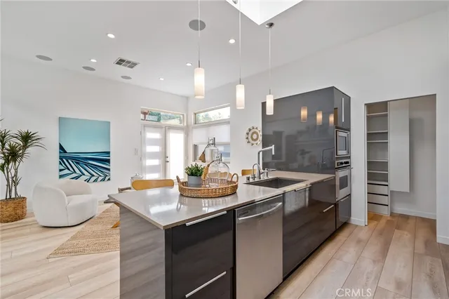 a bedroom with a large bed and a couch