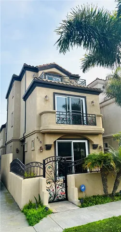 a view of swimming pool with outdoor seating and plants
