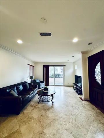 a large kitchen with a table and chairs in it