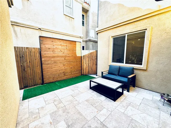 a bedroom with bed and window