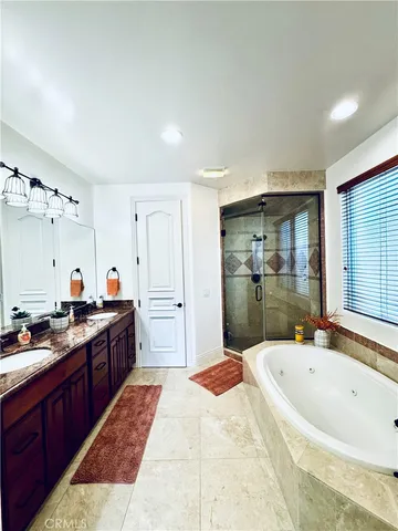 a view of a chairs and table in the balcony