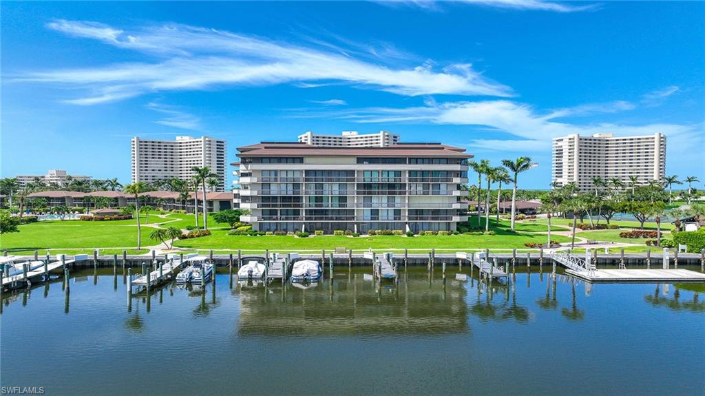 601 Seaview Court, Unit C106 Marco Island, FL 34145 - Photo 1 of 42 Water view with a boat dock