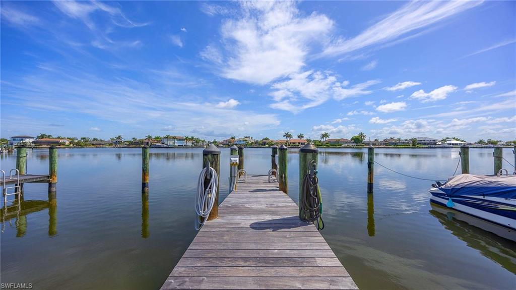 601 Seaview Court, Unit C106 Marco Island, FL 34145 - Photo 27 of 42 Dock featuring a water view