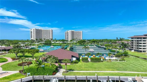 a view of an ocean with outdoor seating