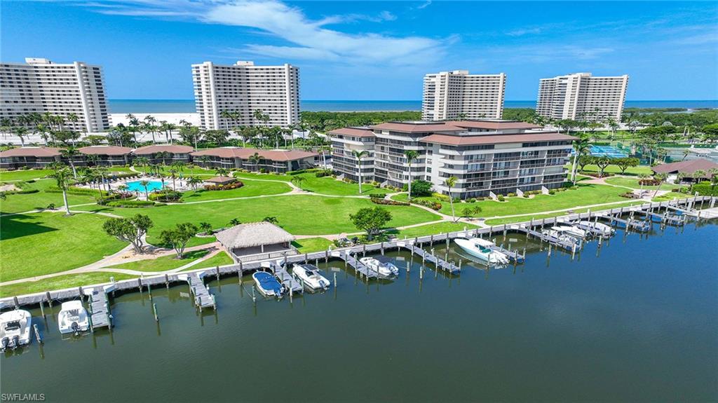 601 Seaview Court, Unit C106 Marco Island, FL 34145 - Photo 35 of 42 Bird's eye view of a nearby body of water and a marina