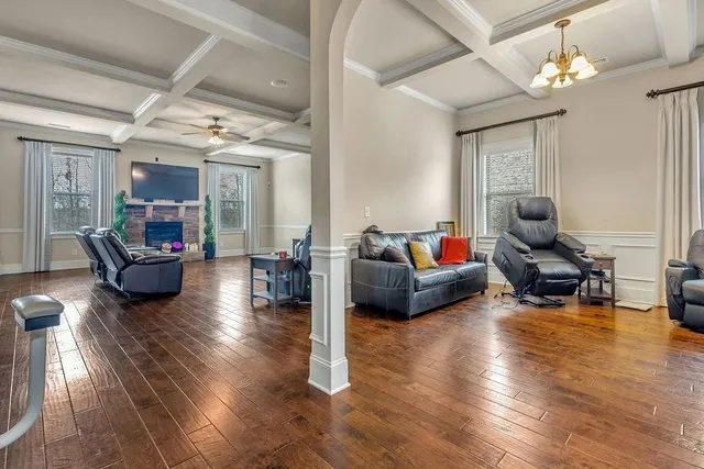 a living room with furniture or couch and a flat screen tv