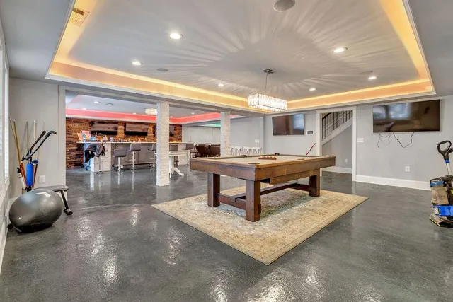 a view of a swimming pool with a yard