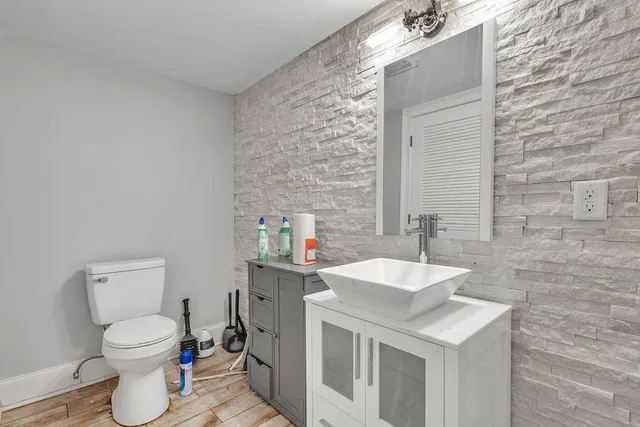 an aerial view of houses with outdoor space and swimming pool