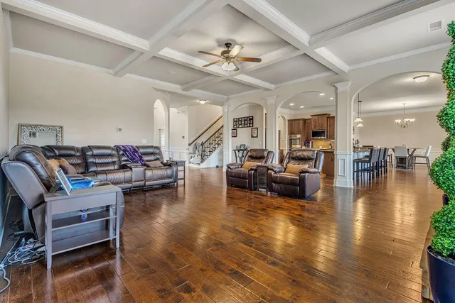 a kitchen with a sink counter top space appliances and a window
