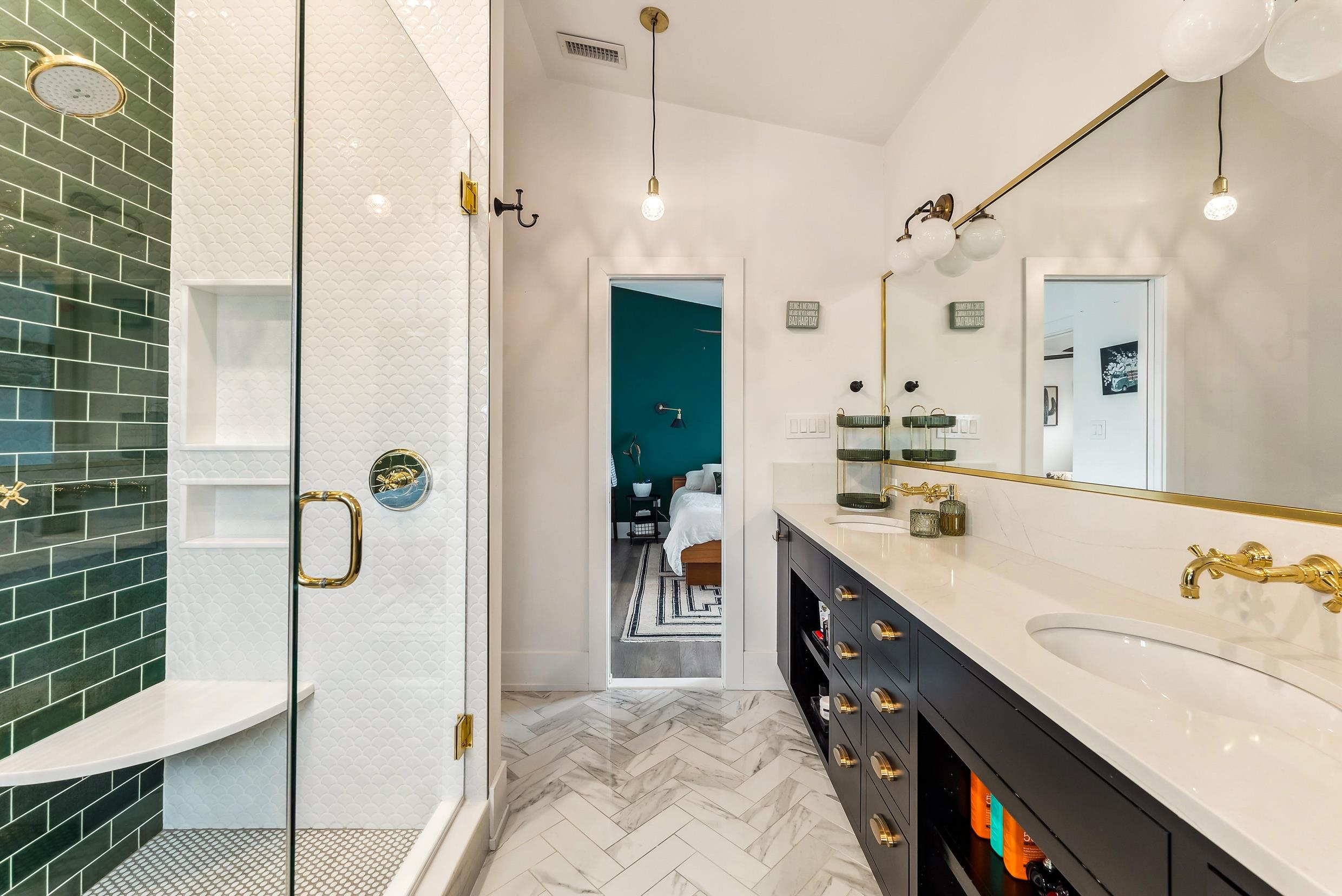 7749 Dune Drive Avalon, NJ 08202 - Photo 41 of 44 a spacious bathroom with a granite countertop sink a mirror and shower