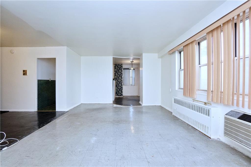 2483 West 16th Street, Unit 7H Brooklyn, NY 11214 - Photo 12 of 24 an empty room with windows