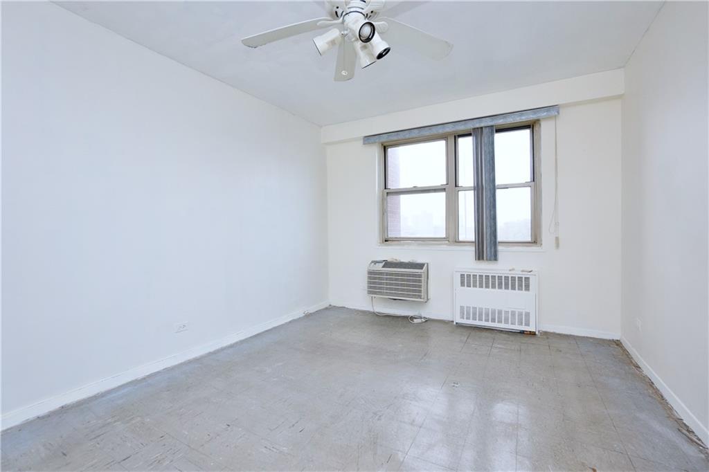 2483 West 16th Street, Unit 7H Brooklyn, NY 11214 - Photo 19 of 24 a view of an empty room with a window