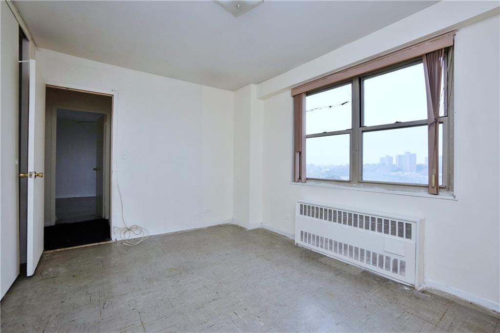 2483 West 16th Street, Unit 7H Brooklyn, NY 11214 - Photo 24 of 24 a view of an empty room with a window