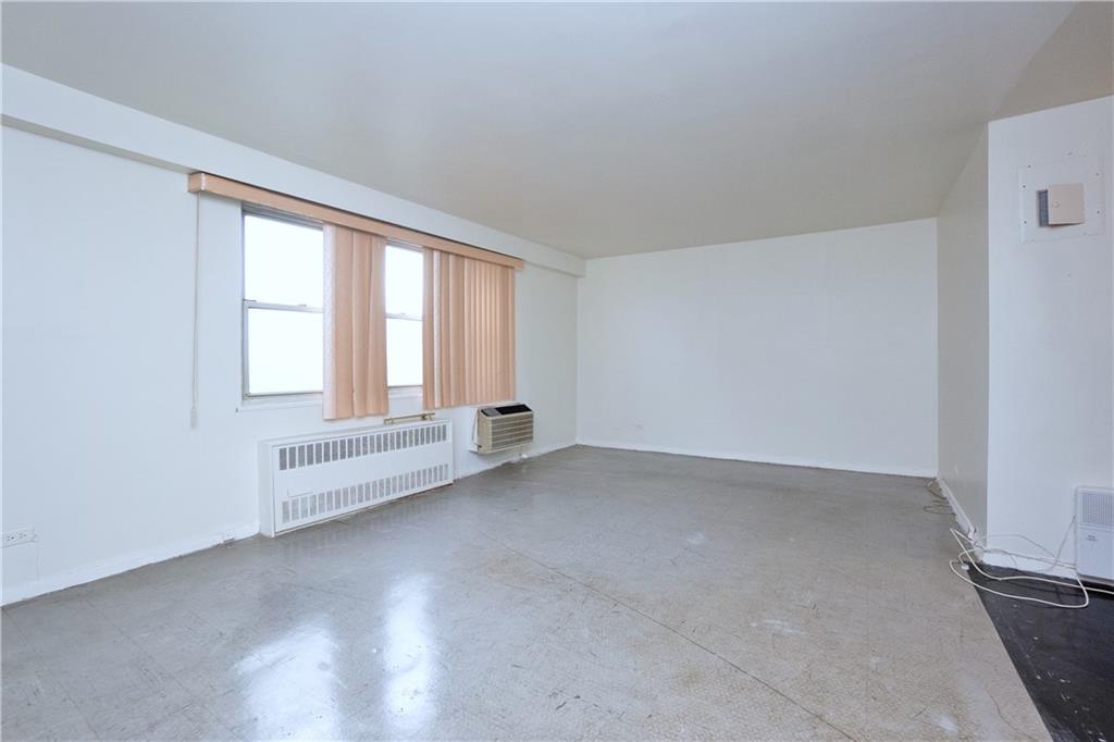 2483 West 16th Street, Unit 7H Brooklyn, NY 11214 - Photo 10 of 24 an empty room with windows