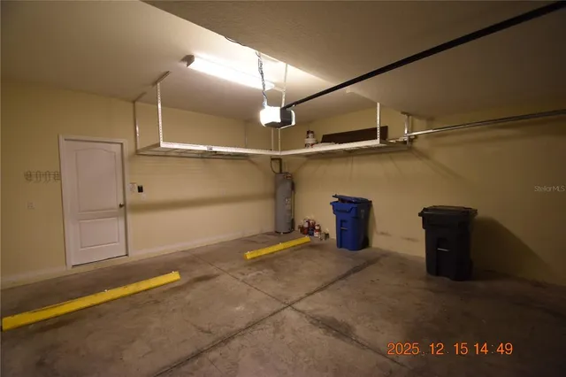 a view of a livingroom with a ceiling fan and window