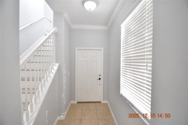 a view of an entryway with a window