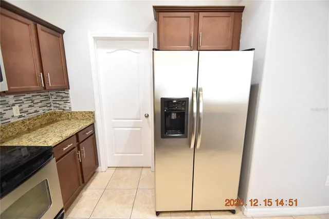 a bathroom with a sink mirror and toilet