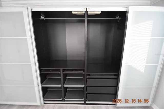 a view of small space with racks on the wall