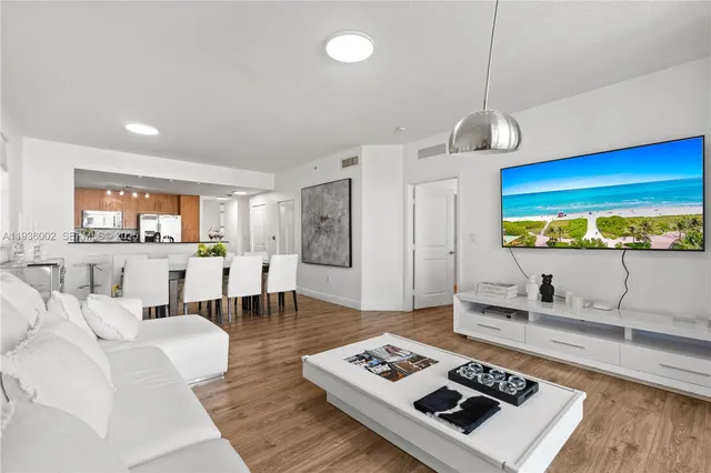 a living room with furniture and a table