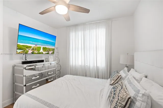 a bedroom with a bed and a closet